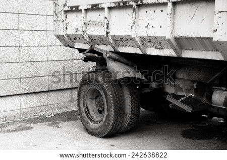 Black and White of a truck with rear wheel / Truck with rear wheel