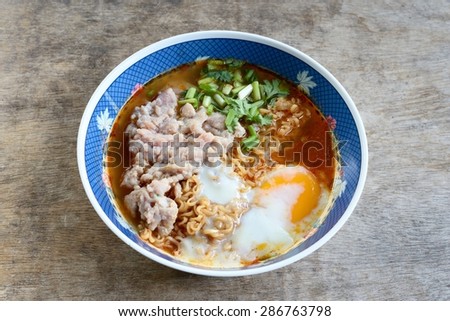 Instant noodles soup with minced pork and egg / Instant noodles soup