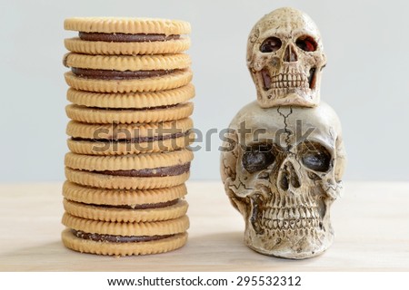 Skull human with Pile of Cookies(Trans fat is trouble for your heart health)