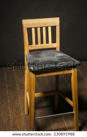 wood chair isolated on black background