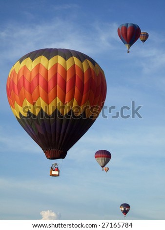 Colorful hot air balloons on the blue sky participating in the Malaysia Hot Air Balloon Festival