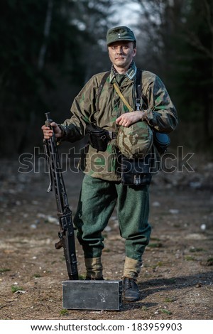 Actor dressed in ammunition German soldier from World War II.