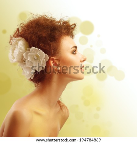 Fashion Beauty Model Girl with Flowers Hair. Bride. Perfect Make up and Hair Style. Hairstyle.
