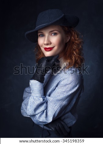 Retro Smiling Woman Portrait on Dark Background. Vintage Style Girl Wearing Old fashioned Hat and Gloves, retro hairstyle and make-up.