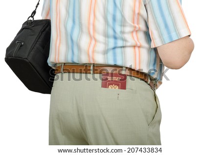 Tourist with Russian passport in right rear pocket of summer pants. View from the back on a white background