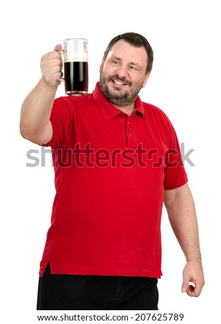 Bearded beer drinker raising dark beer tankard with right hand. He stares at mug on white background