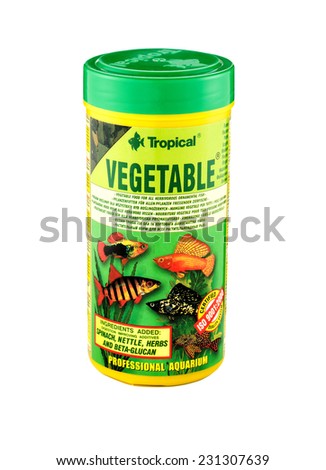 Rishon Le Zion, Israel - November 13, 2014: Plastic can of Tropical Vegetable Flakes. A high protein flake food 300ml. For daily feeding of aquarium fish. Produced by Tropical Company, Poland