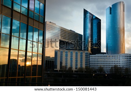 PARIS, FRANCE - APR 8: Skyscrapers in business district of Defense . Photo taken on apr 8 , 2013. Defense is biggest business district in France and most of large companies have offices here.