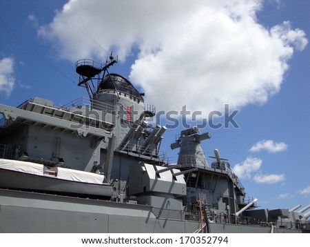 Historic USS Missouri Guns, radar, and satellite towers at midship docked in Pearl Harbor on Oahu, Hawaii.