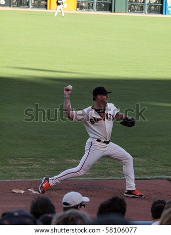 SAN FRANCISCO, CA - JULY 28: Giants Vs. Marlins: Giants Closer Brian Wilson warms up to close game wearing bright orange shoes at AT&T Park July 28, 2010 in San Francisco, California.
