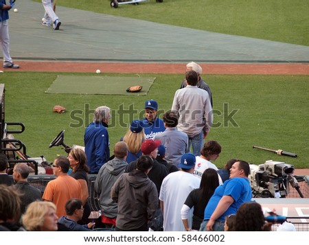 SAN FRANCISCO, CA - JULY 30: Dodger vs. Giants: Manager Joe Torre talks with people before the start of game.    July 30, 2010 Att Park in San Francisco CA.