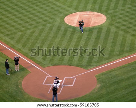 OAKLAND, CA - AUGUST 16: Blue Jays vs. Athletics: Athletics Season Ticket holder throws out the honorary first pitch.  Taken on August 16 2010 at Coliseum in Oakland California.