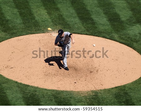 OAKLAND, CA - AUGUST 18: Blue Jays vs. Athletics: Blue Jays Pitcher Marc Rzepczynski throws a pitch, ball soars though air.  August 18 2010 at Coliseum in Oakland California.