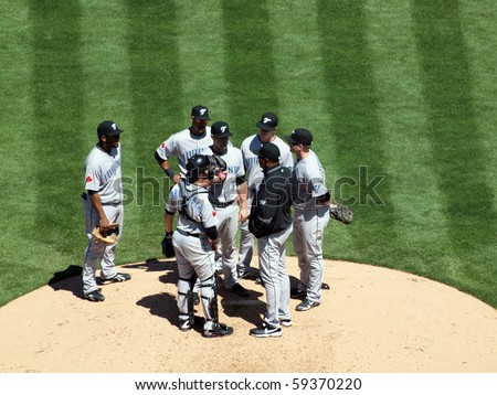 OAKLAND, CA - AUGUST 18: Blue Jays vs. Athletics: Blue Jays have a meeting on the mound with coach to discuss what to do during upcoming play.  Taken August 18 2010 at Coliseum in Oakland California.