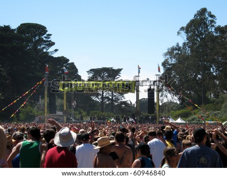 SAN FRANCISCO - SEPTEMBER 11: People wave hands in the air as Rebelution Plays at Power to the Peaceful 2010 Music Festival.  Taken September 11, 2010 at Golden Gate Park San Francisco.
