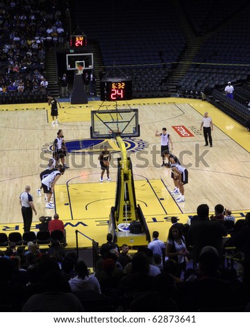 OAKLAND, CA - OCTOBER 6: Golden State Warriors player Aaron Miles sets to take free throw shoot with players lined up Open Practice at the Oracle Arena taken October 6, 2010 Oakland California.