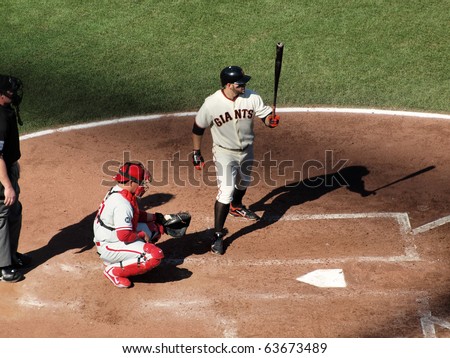 SAN FRANCISCO, CA - OCTOBER 19: Giants vs. Phillies: Cody Ross steps into the batters box with Carlos Ruiz catching game three of the NLCS 2010 October 19, 2010 AT&T Park San Francisco.