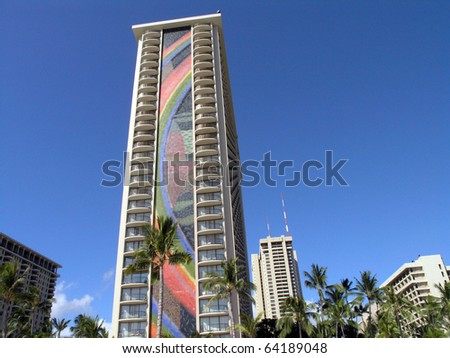 HONOLULU, HI - JUNE 22: Waikiki Rainbow Tower a Oahu landmark with mosaic tile rainbows on either side of the building. Mosaics are listed in Guinness Book of World Records. June 22 2005 Waikiki, HI.