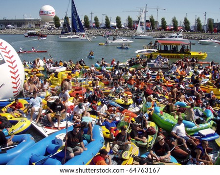 McCovey Cove next to At&T Park filled with people during Home Run Der by rafts in San Francisco California July 9th 2007