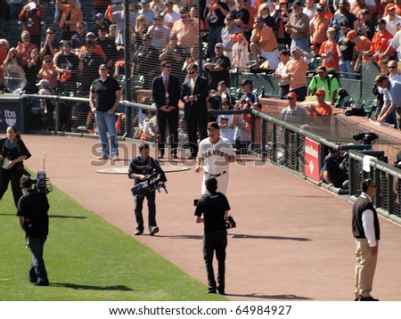 SAN FRANCISCO, CA - OCTOBER 19: Giants Manager Bruce Bochy runs out on to the field during pregame intros before the start of game 3 of the NLCS 2010 taken October 19, 2010 AT&T Park San Francisco