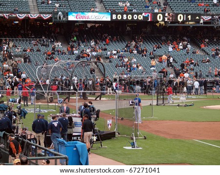 SAN FRANCISCO, CA - OCTOBER 28: MLB Network crew prepares for broadcast as players take batting practice in background game 2 2010 World Series Giants and Rangers Oct. 28, 2010 AT&T Park San Francisco