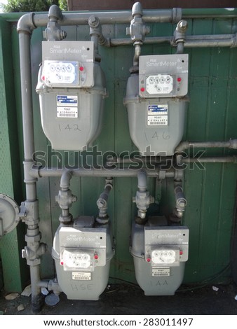 SAN JOSE - MARCH 30: Four PG&E (utility co) electricity SmartMeters which monitor energy quality and provide real time energy consumption data. Assembled in Mexico. San Jose, California March 30, 2015