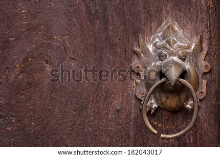 metal door knocker, Asia Thai style metal garuda door knocker on wooden door