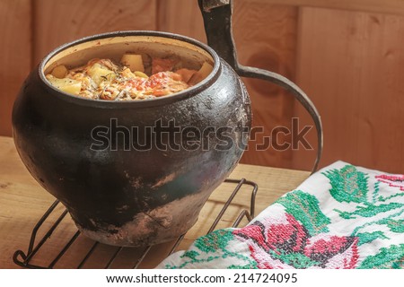 Traditional stew meal cooked in Russian wood-fired oven