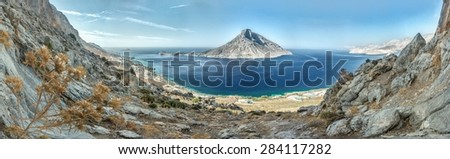 Scene of Telendos island\'s panorama from the north side of Kalymnos island high up above Masouri village in Mediterranean Greek Dodecanese
