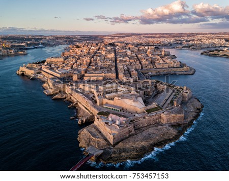 Aerial drone sunrise photo - Ancient capital city of Valletta Malta.  Island Country of Europe in the Mediterranean Sea