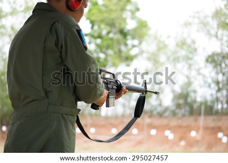PHITSANULOK Army Camp, THAILAND  - Unidentified that young soldier shooting the rifle.on July 9, 2015 in Phitsanulok. Phitsanulok is the hub of all commercial activity in Northern of Thailand.