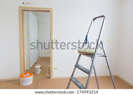 Ladder, roller and buckets, home renovation