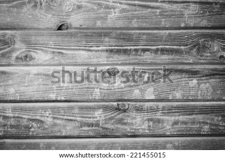 Faded black and white wooden house wall for background