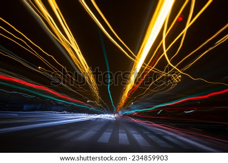 Colorful long exposure traffic lights\' lines in the city