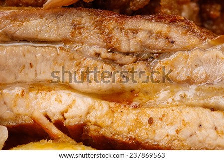 Greasy baked ribs with excess of oil