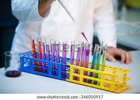 Demonstration of full pH scale in test tubes in a laboratory