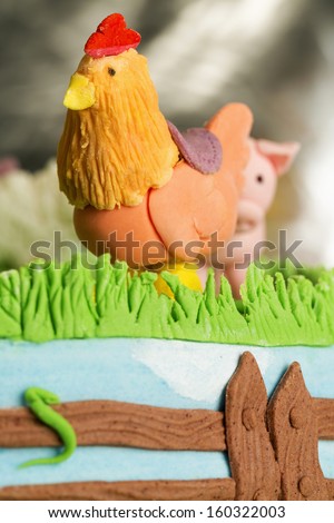 Fondant Cake/Farm themed cake with edible pig and rooster. Holiday cake. Animal figure on top of the cake.