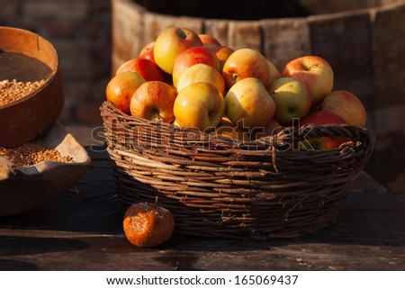 Apples in basket/Farmers market. Organic fruits and vegetables on market. Apple and corn.