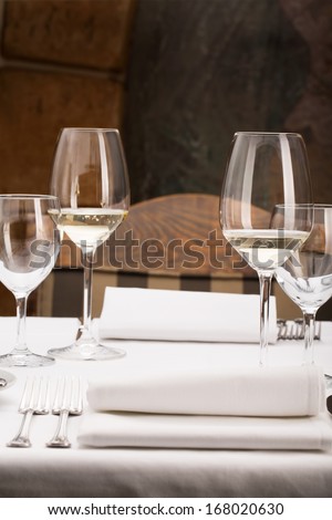 Fine dining restaurant/Fine dining restaurant. Dinner table place setting.