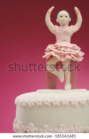 Cake/Decorative fondant pink cake on picnic table. Ballerina cake