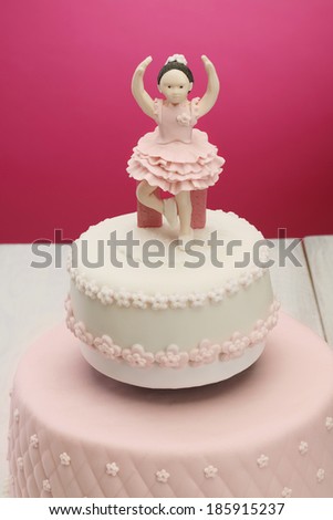 Cake/Decorative fondant pink cake on picnic table. Ballerina cake