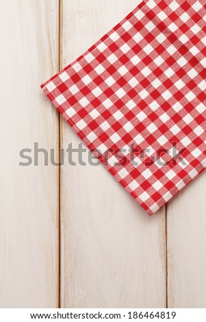 Plaid cloth on picnic table/Picnic table background
