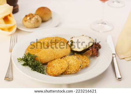 Breaded deep fried peppers.Breaded deep fried peppers with filled zucchini/Restaurant served meal