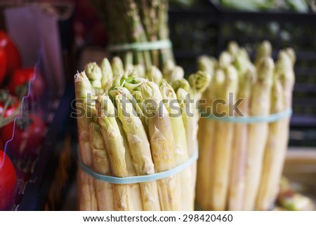 Natural organic green asparagus displayed at the market/Fresh organic peeled asparagus