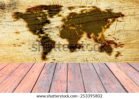 Paving with Burned map world on wood.