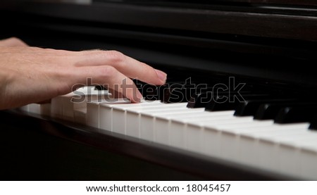 I music maker! Closeup photo of piano player mans handle.