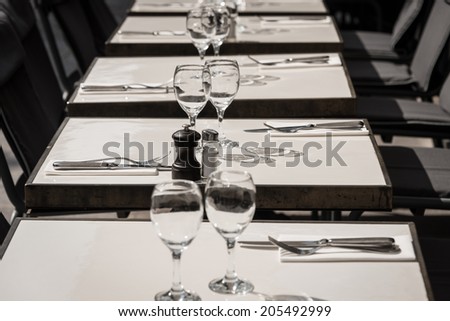 Table setting at street cafe, Paris, France