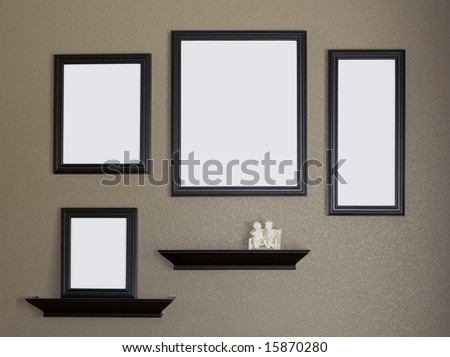 Collage of Black blank Picture Frames and shelves against brown textured wall