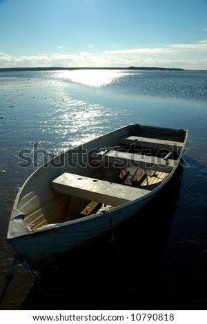 Old row boat beached on a tidal flat, Cape Cod