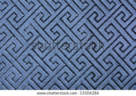 Threaded Asian maze infinite pattern on blue silk